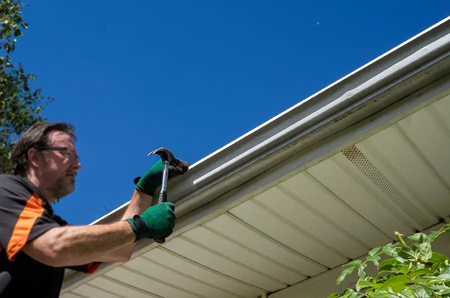 professional repairing/replacing old gutter system on house - Clinton County, IL