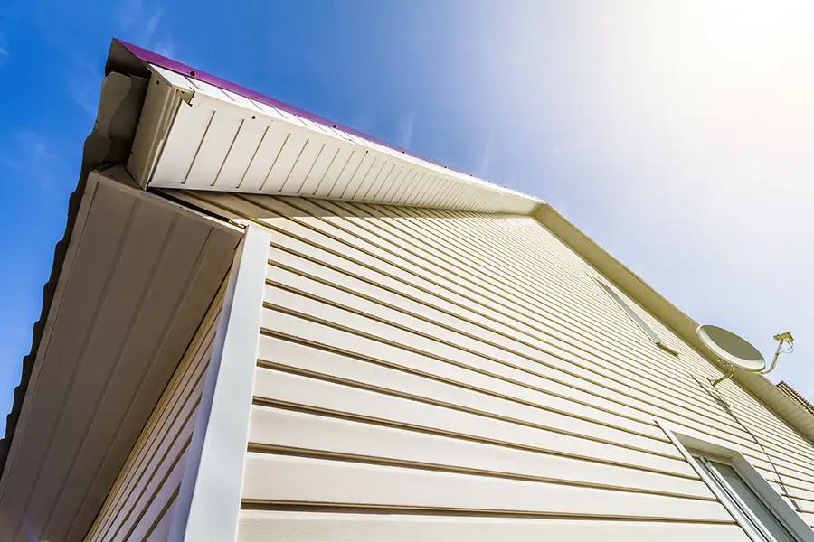 View from below of house siding, with soffit and fascia - Clinton County, IL