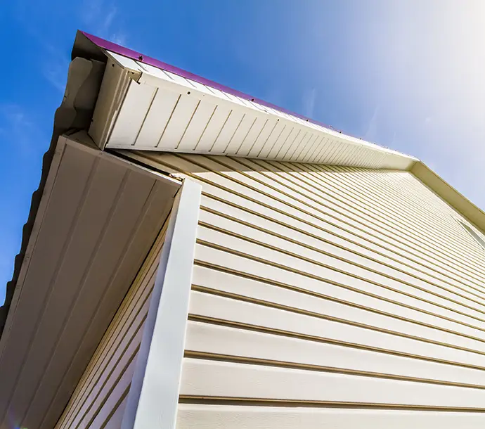 View from below of house siding, with soffit and fascia - Clinton County, IL