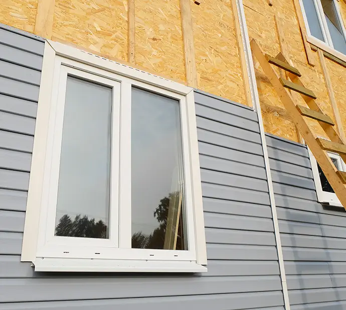 New house construction vinyl siding installation - Collinsville, IL