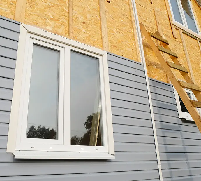 New house construction vinyl siding installation - Marion County, IL
