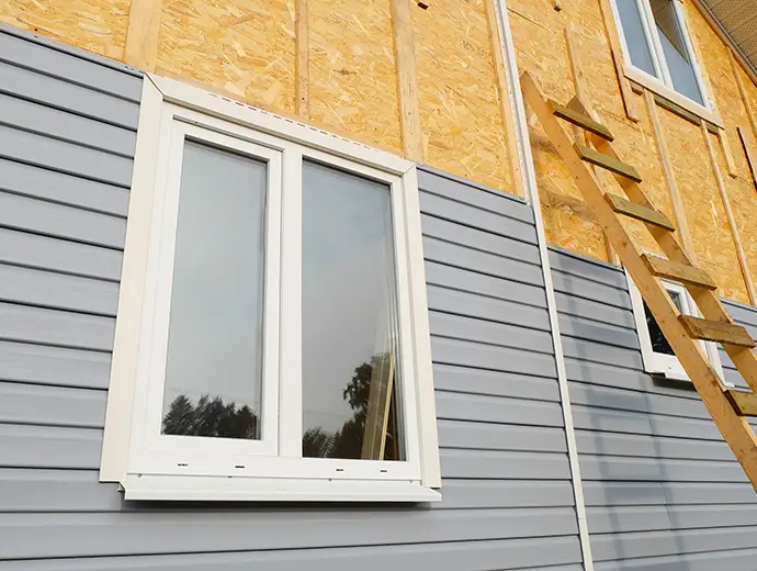 New house construction vinyl siding installation - Clinton County, IL