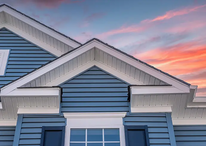 gorgeous view of residential home with blue siding an trim, plus white soffit and fascia - Marion County, IL